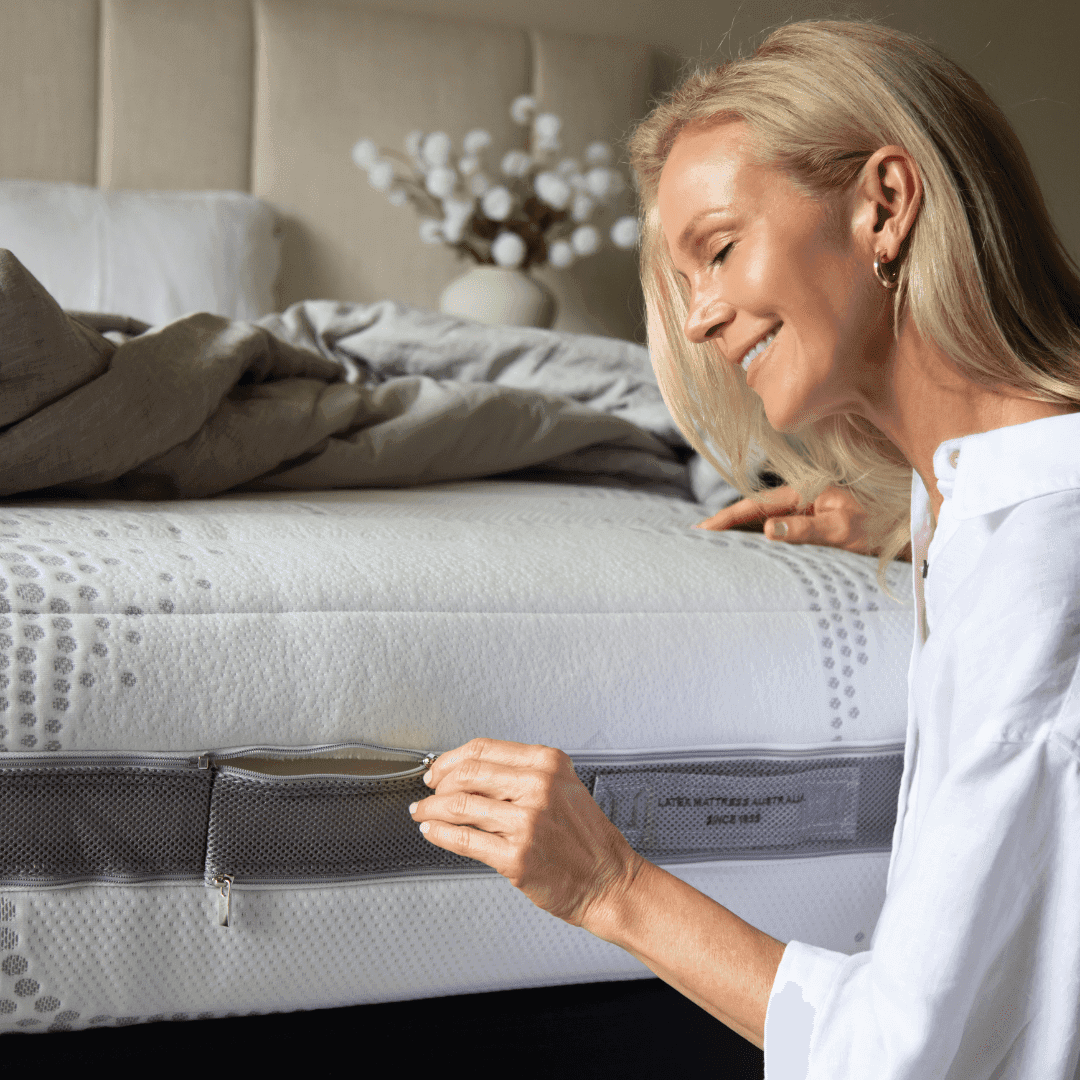 Embroidered handles and zip-off removable cover on the Pure Comfort latex mattress for easy rotation and care