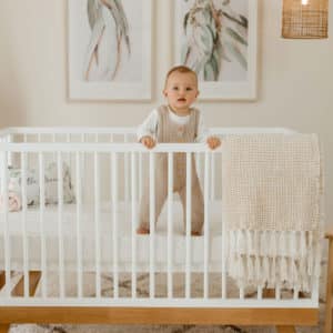 Baby in a cot