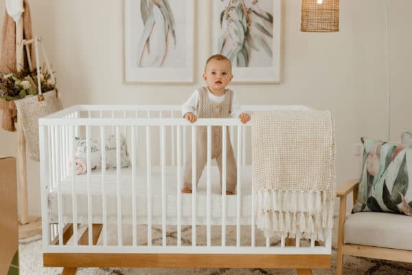 Baby in a cot